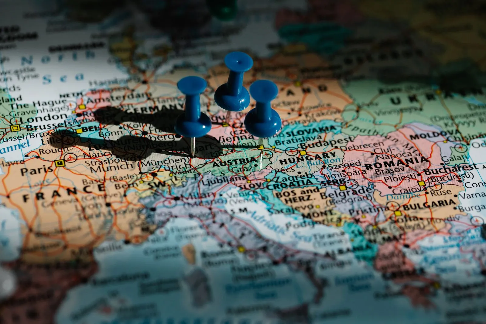 Pins marking countries on a map of Europe, representing goods stored in Italy and sold across EU markets